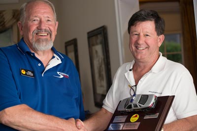 photo of Greg Glassner getting Smokey award from Bill Sanders